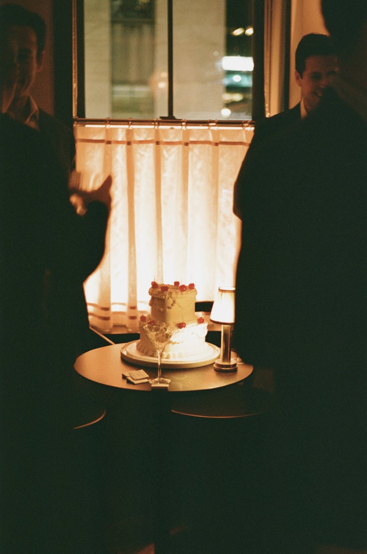 Photo of cake sitting in a restaurant window taken by Parker