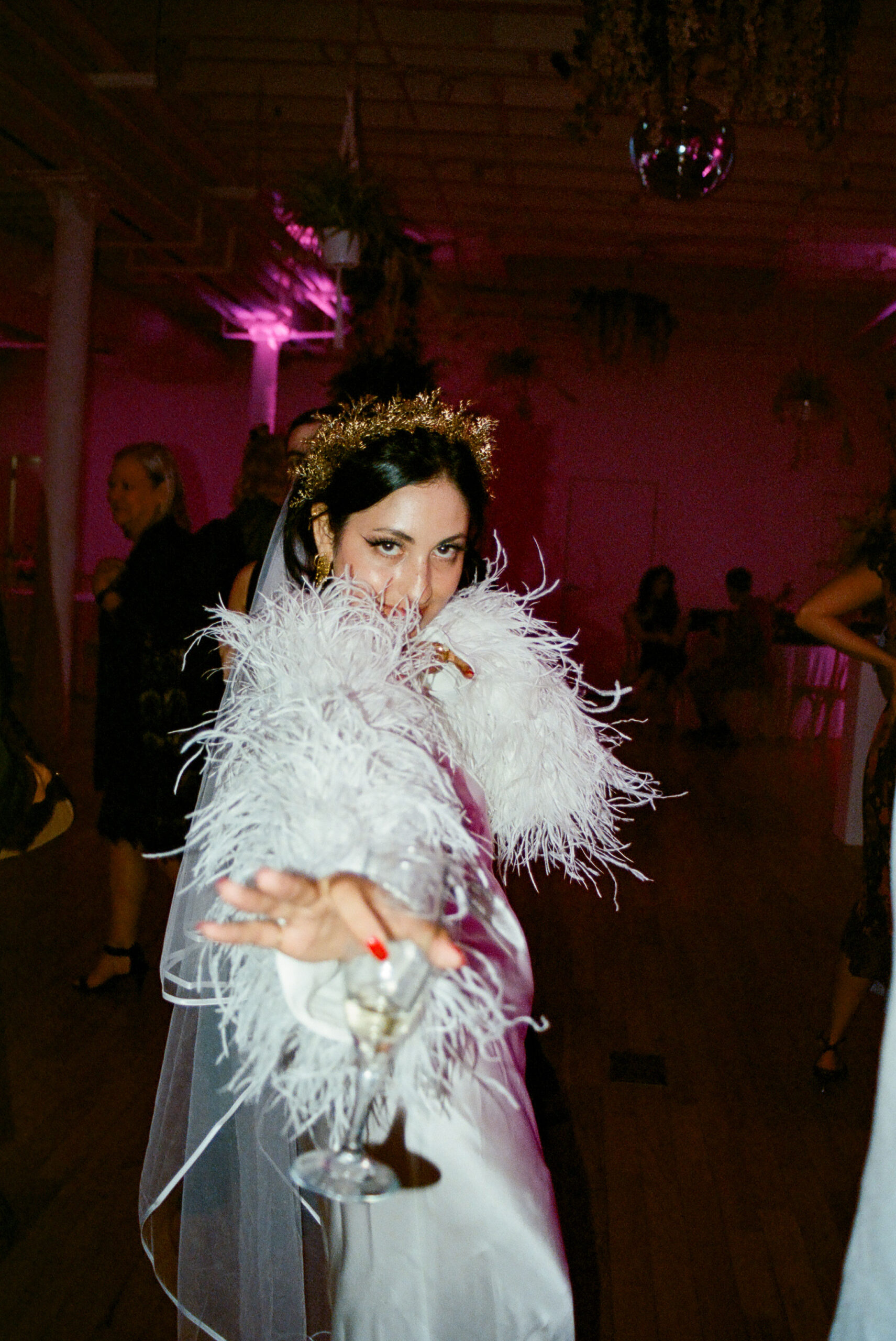 bride with feather bolero by cult gaia shot on film by parkers pictures