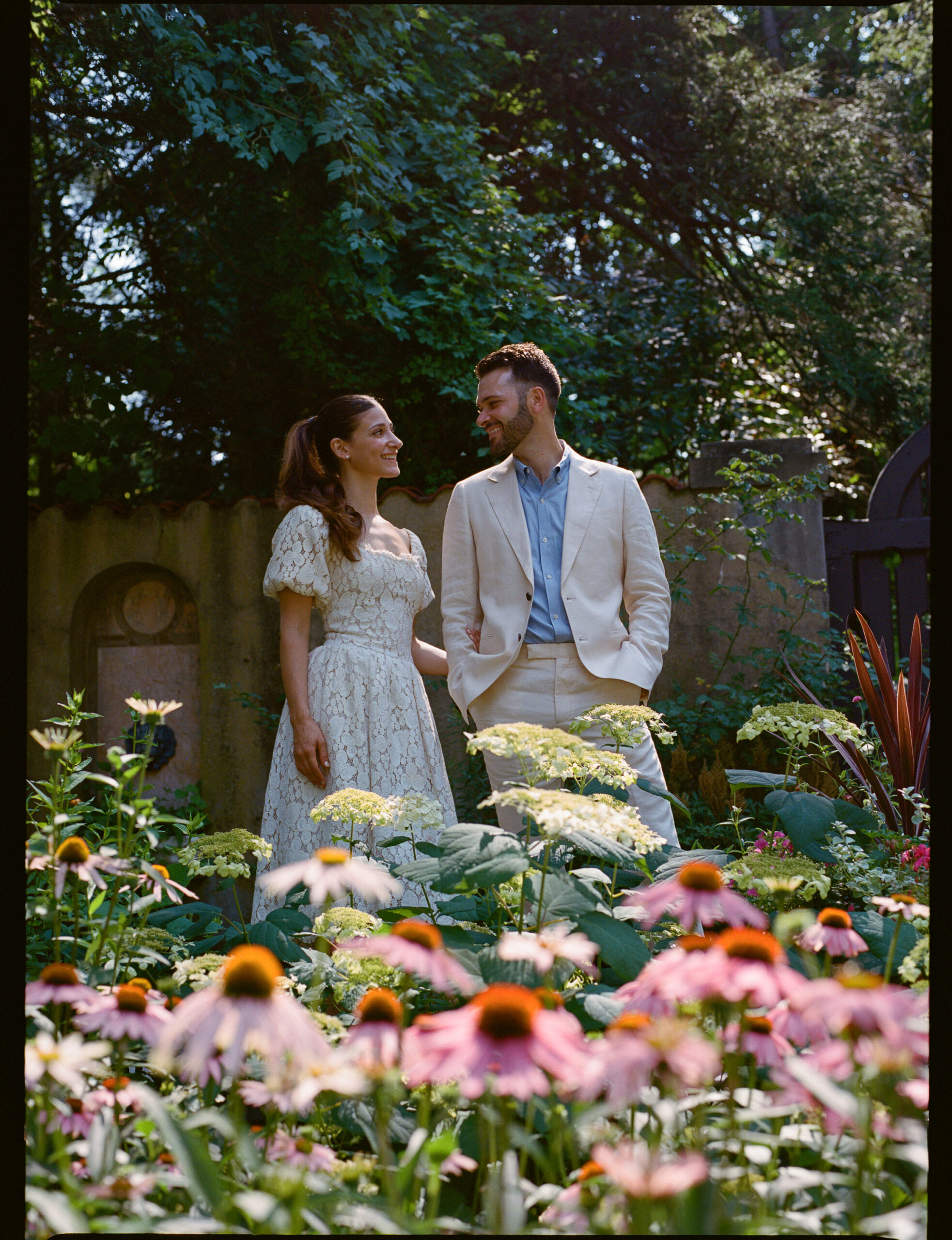 couple in a wildflower garden in westchester new york shot on medium format film by parkers pictures