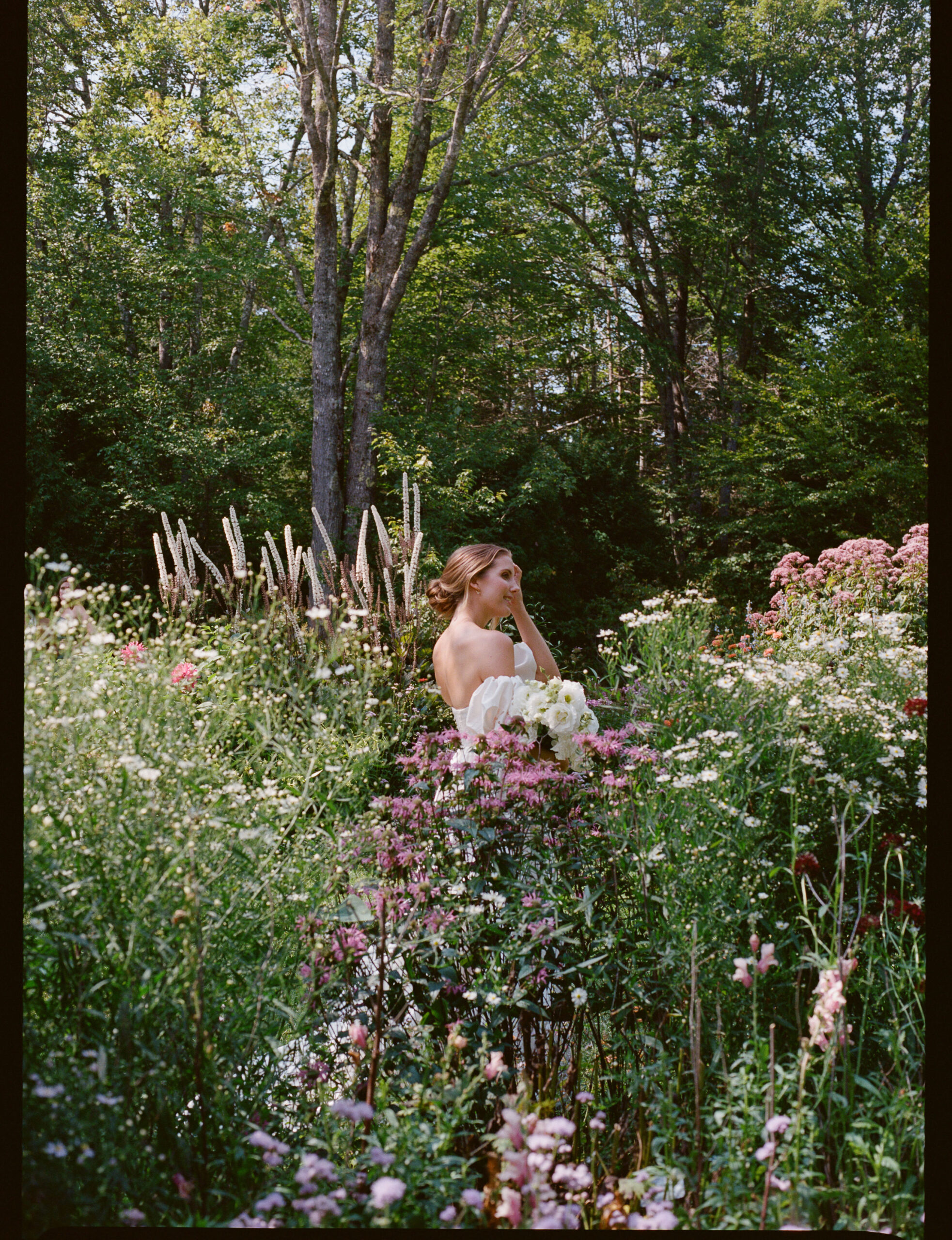 bride among flowers wedding on mount desert island maine shot on film by parkers pictures