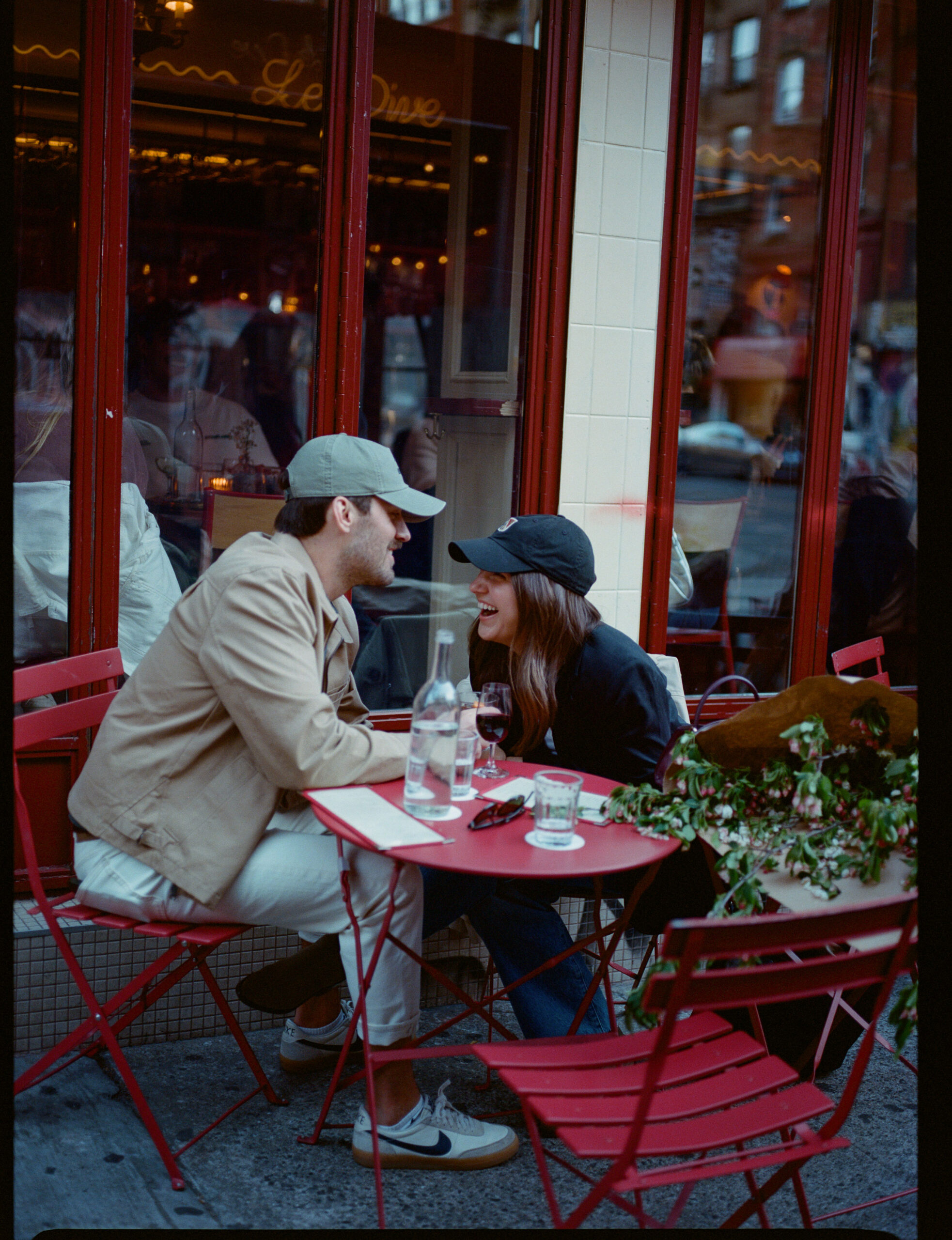 Couple laughing at Le Dive NYC taken by Parkers Pictures